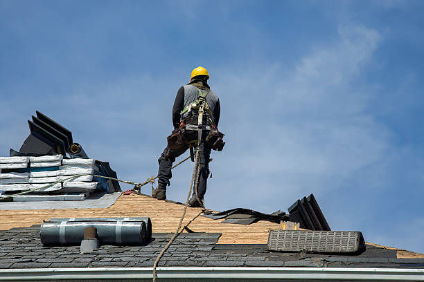 Professional Roof Replacement technician working in Grandview, IN